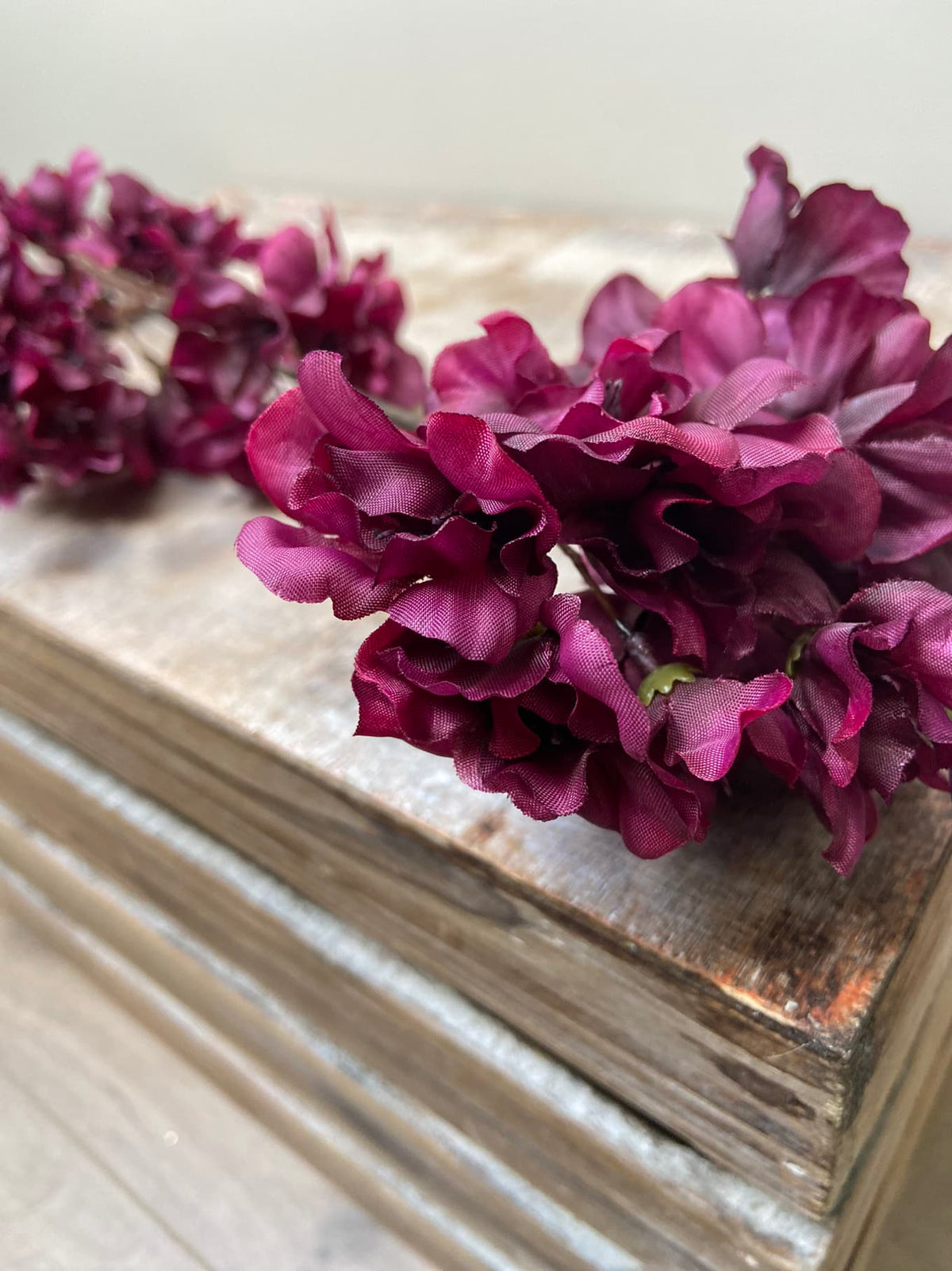 Silk blossom branch Prunus aubergine