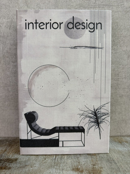 Beige opbergboek van Homebound met zwarte Interior design-print en een bruin opbergvak aan de binnenzijde.