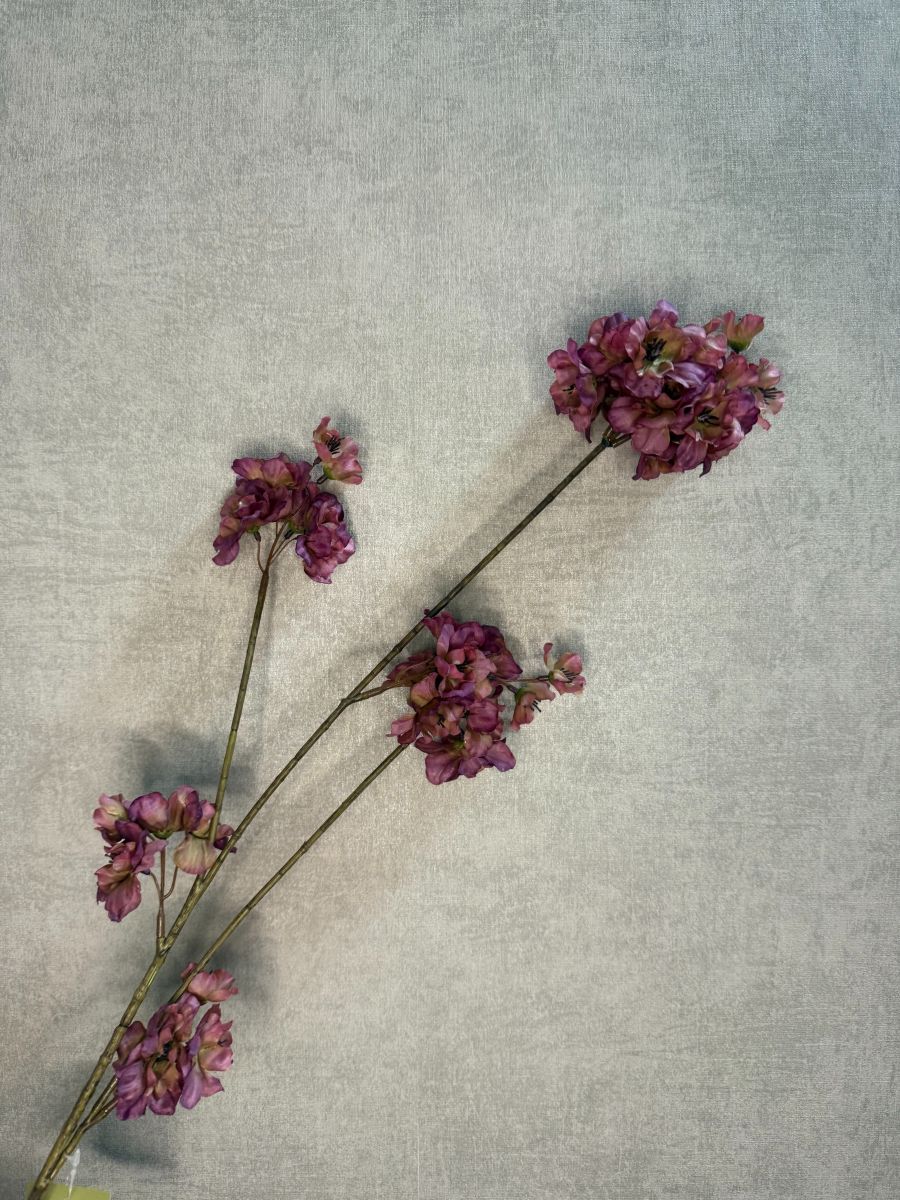 Silk blossom branch Prunus purple